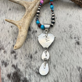 Purple Dahlia Kingman Turquoise Heart pendant with hanging teardrops