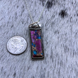 Purple Dahlia Kingman Turquoise Hanging Bar necklace with a cowboy hat