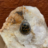 Cute little Iron Buffalo oval necklace