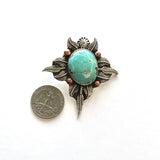 Turquoise with a southwestern flair Pendant