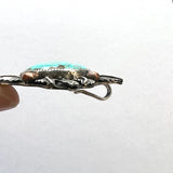 Turquoise with a southwestern flair Pendant