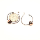 Sterling Silver hoop earrings with sliding copper balls