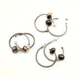 Sterling Silver hoop earrings with sliding copper balls