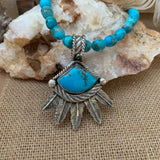 Sterling Silver feathers with Kingman Turquoise Pendant