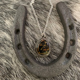 Cute little Iron Buffalo oval necklace