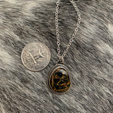 Cute little Iron Buffalo oval necklace