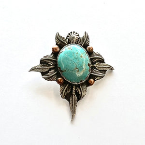 Turquoise with a southwestern flair Pendant