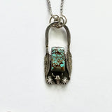 Turquoise, feathers with a longhorn steer necklace