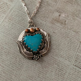 Kingman Turquoise Heart Sterling Silver Necklace with a beautiful tiny rose.