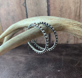 Sterling Silver hoop earrings with Twisted wire